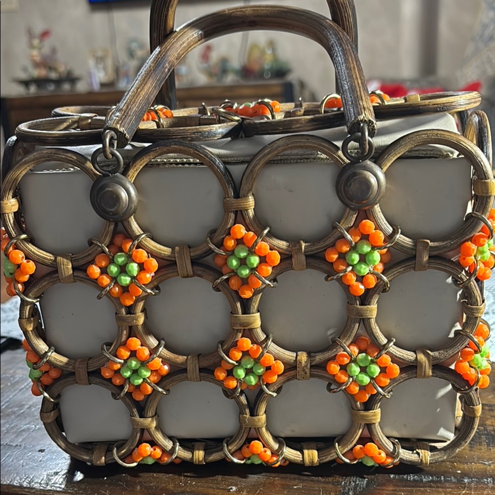 Striking Orange and Green Tote with Metallic Structure and Beaded Design